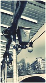 Low angle view of street light against sky