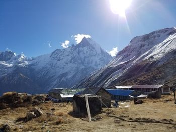 Scenic view of snowcapped mountains against sky