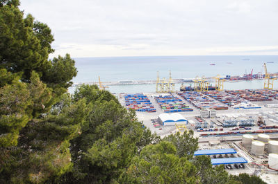 High angle view of trees and buildings against sky