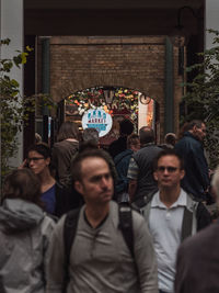 Group of people in front of building