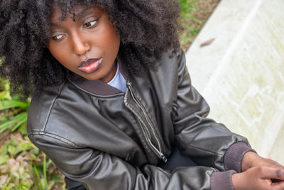 Portrait of young woman looking away