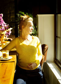 Woman in a coffee, spain