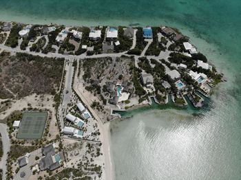 High angle view of buildings by sea