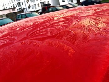 High angle view of wet red car