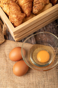 High angle view of bread in basket on table