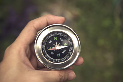 Close-up of hand holding camera