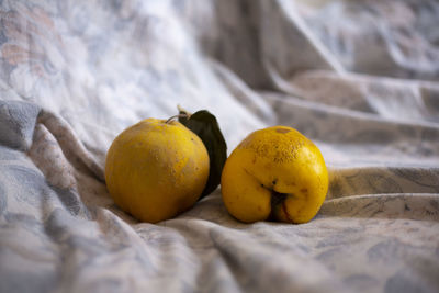 Close-up of fruits on bed