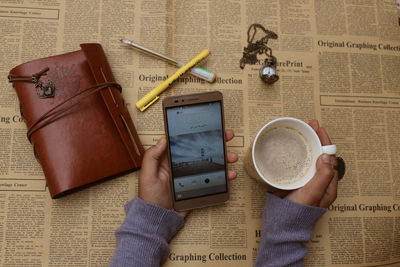 High angle view of coffee cup on table