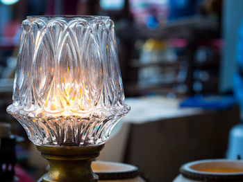 Close-up of wine glass on table at cafe