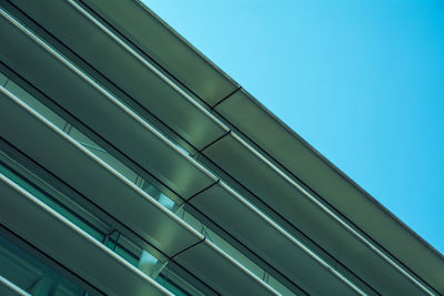 Low angle view of built structure against clear blue sky