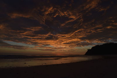 Scenic view of sea at sunset