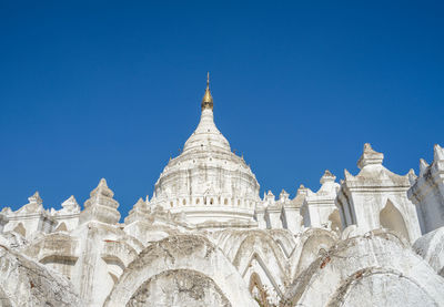 Low angle view of a building against blue sky