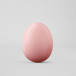 Close-up of easter egg over white background