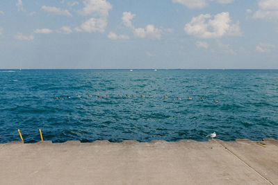 Scenic view of lake against blue sky