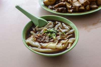 High angle view of soup in bowl on table