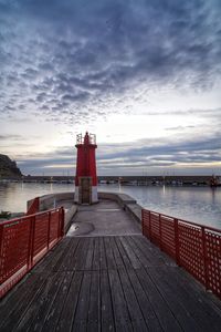 Pier over sea against sky