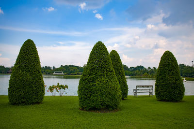 Scenic view of formal garden against sky