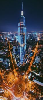 Illuminated buildings in city at night