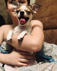 Midsection of woman with dog