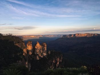 Scenic view of landscape against sky during sunset