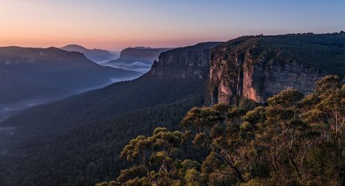 Scenic view of mountain against sky during sunset