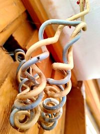 High angle view of spiral tied up on metal