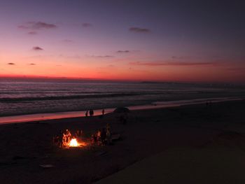 Scenic view of sea against sky at sunset