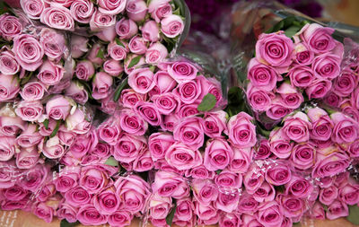 Close-up of pink rose bouquets on table
