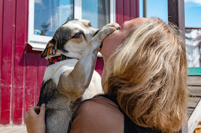 Portrait of woman with dog