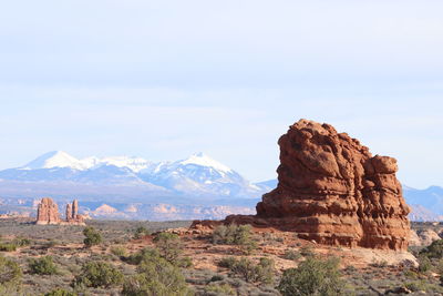 Rock formations on mountain against clear sky