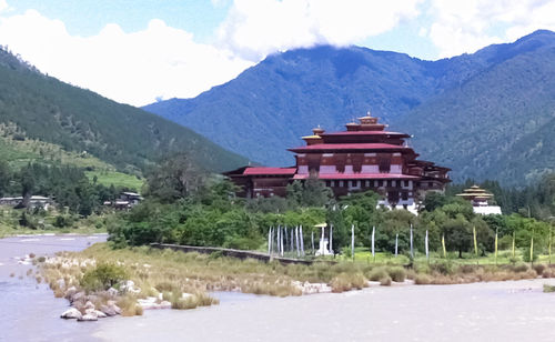 View of mountain range against cloudy sky