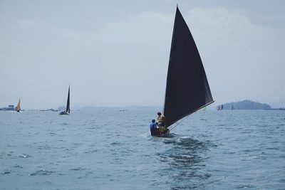 Boats sailing in sea