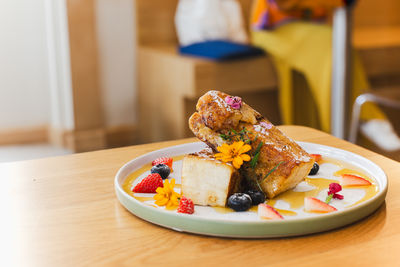 Close-up of food in plate on table