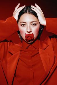 Close-up of young woman wearing mask