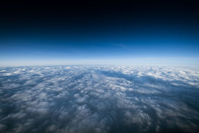 Aerial view of cloudscape against blue sky