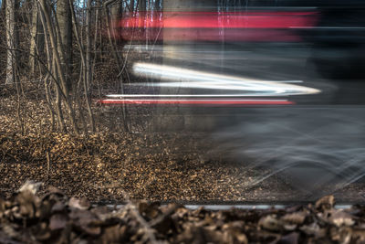 Blurred motion of cars on street