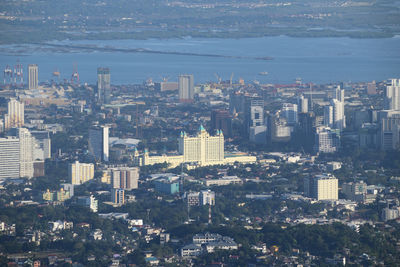 High angle view of buildings in city against sky