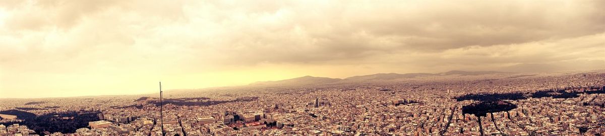 Panoramic shot of cityscape against sky