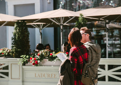 Young couple standing outdoors