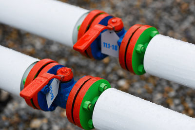 Close-up of multi colored pipe on snow