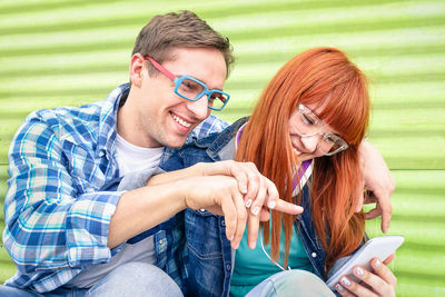 Young man using mobile phone