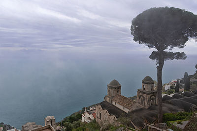 Panoramic shot of buildings and sea against sky