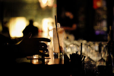 Close-up of glasses at bar counter