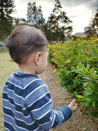 Cute boy looking away outdoors