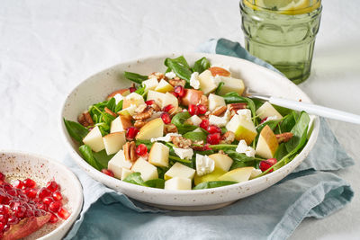 High angle view of fruit salad in bowl on table