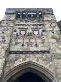 Low angle view of old building against sky