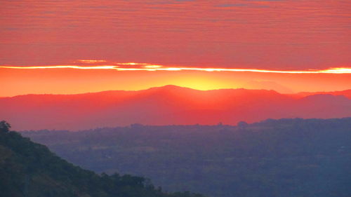 Scenic view of mountains at sunset