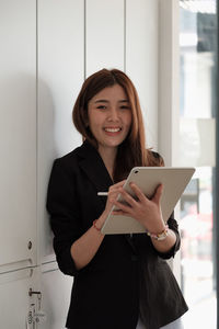 Young woman using mobile phone