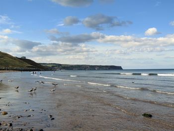 Scenic view of beach against sky