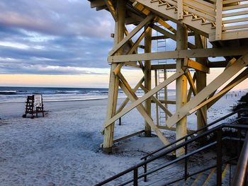 View of pier on sea against sky